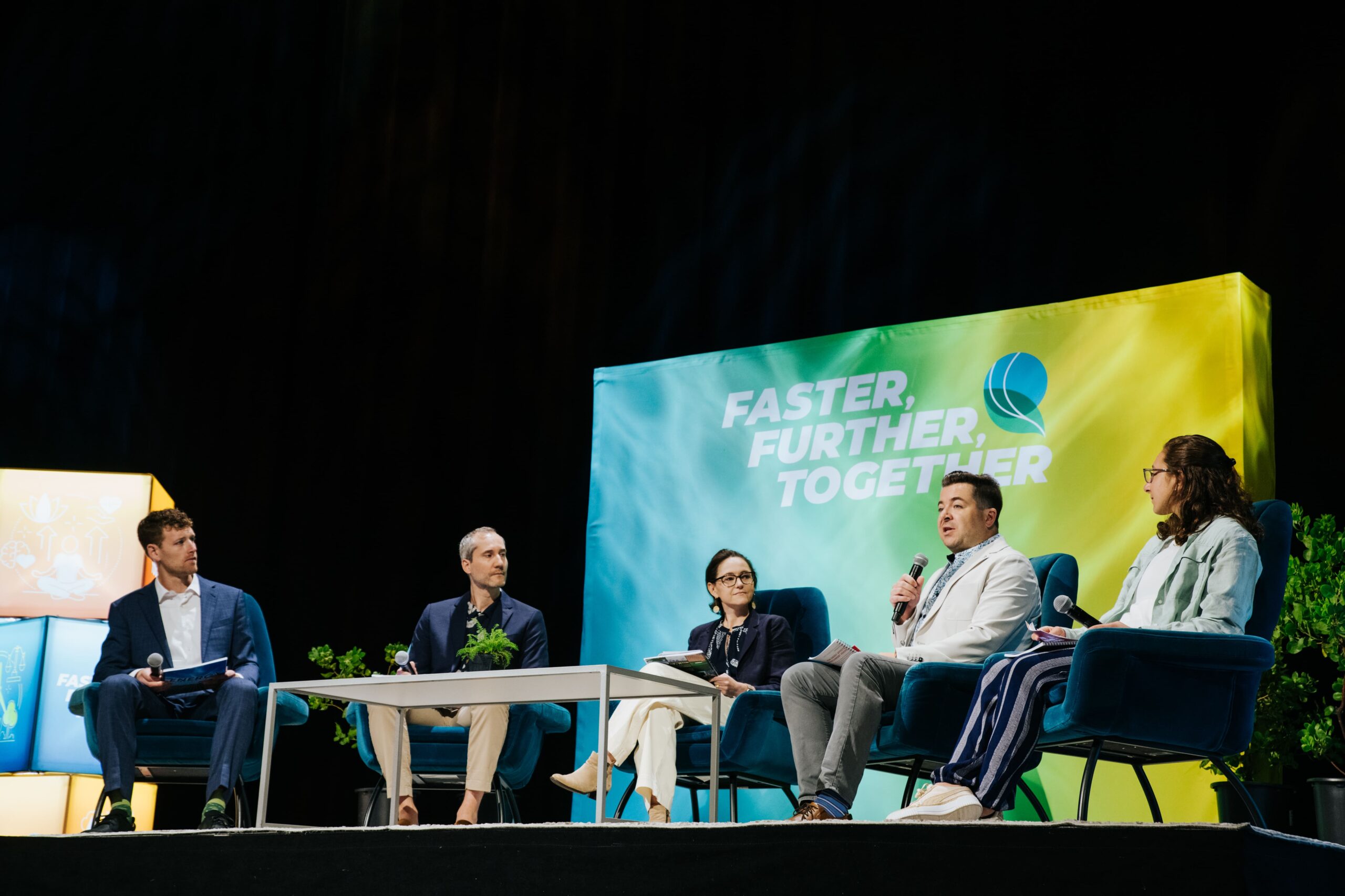 Industry experts participate in a sustainability panel during the Green Sports Alliance Summit .