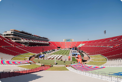 Wide view of FIFA Fan Fest at the Los Angeles Memorial Coliseum featuring custom event branding, field graphics, and fan activation areas produced by A3 Visual.