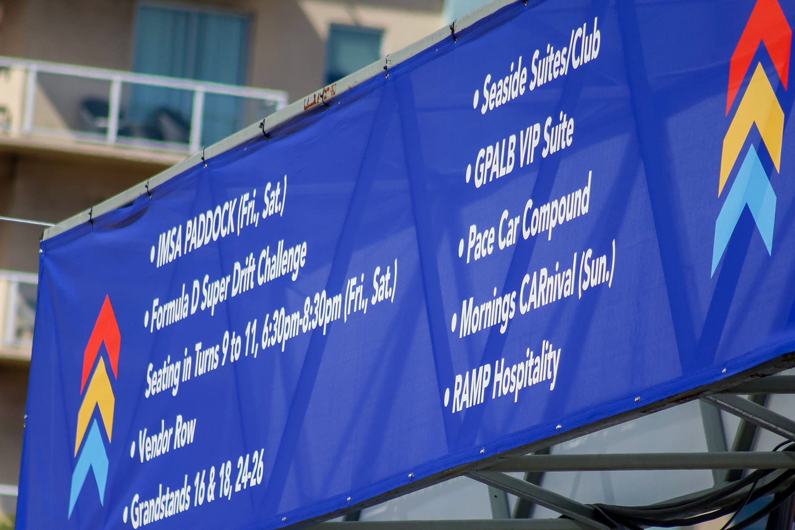 Custom sponsor banner installed on the grandstands for the Acura Grand Prix of Long Beach.