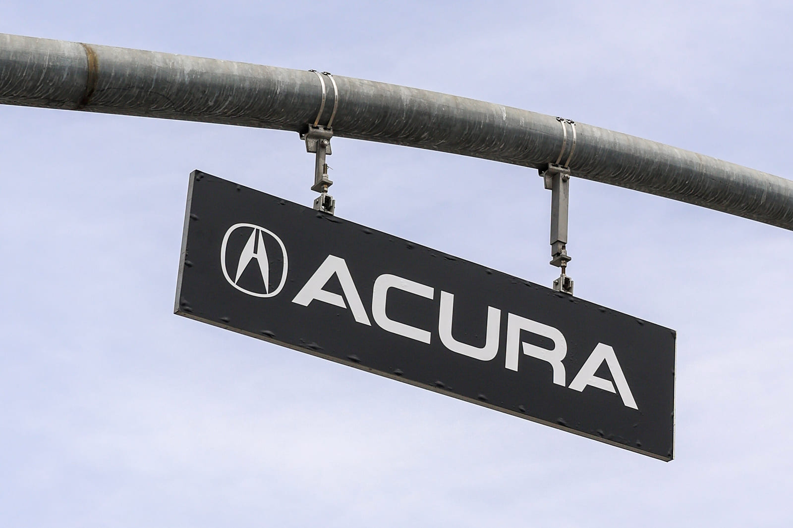 Custom Acura decal installed on street lightpost around the racecourse at the Acura Grand Prix of Long Beach.