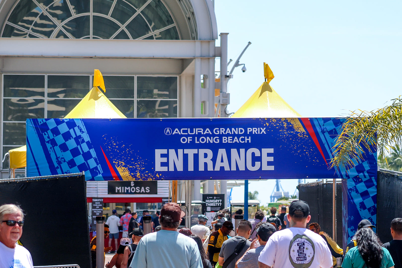 Custom entrance arch graphics welcoming guests to the Acura Grand Prix of Long Beach.