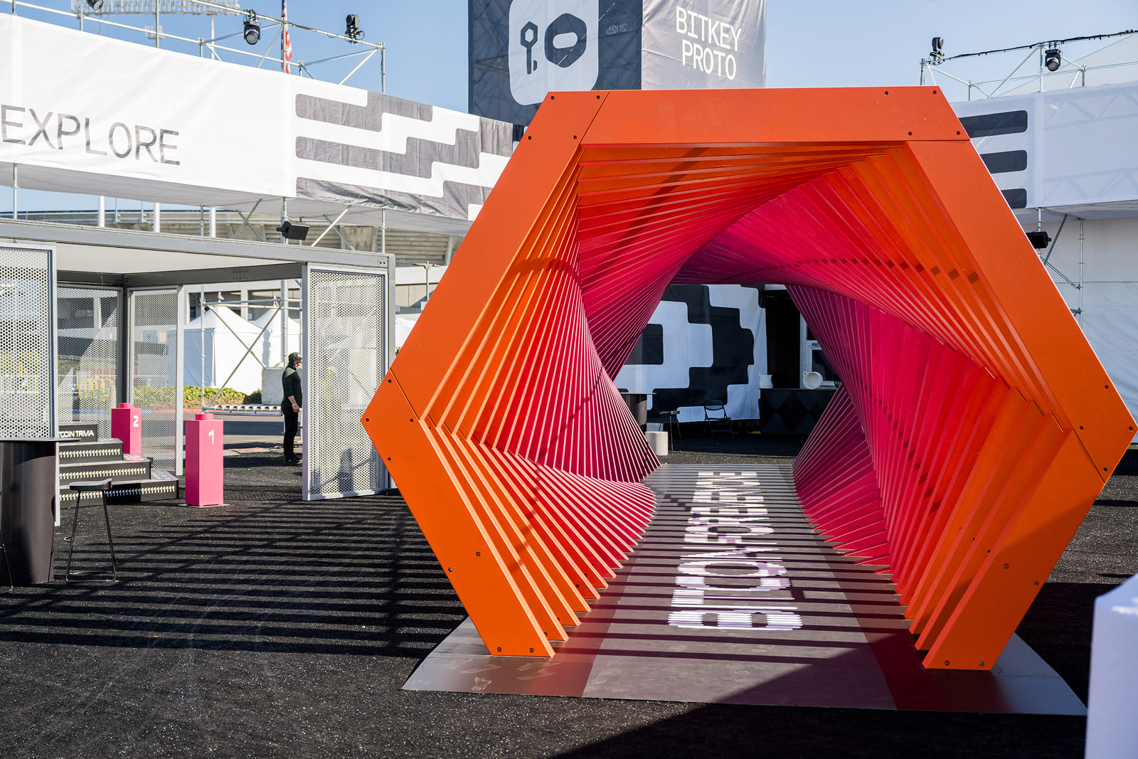 Custom graphic wraps applied to the signature hexagon tunnel activation at Block By Block 2025.