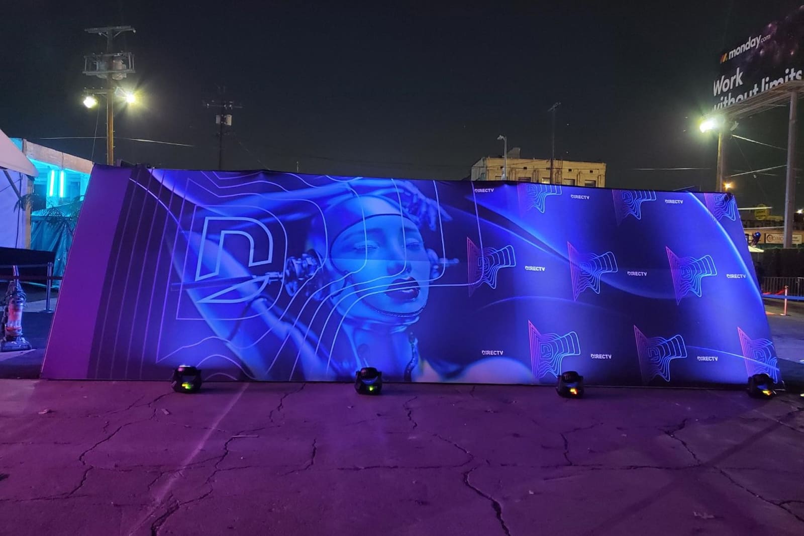 Custom DIRECTV experiential tunnel wrapped with large-format graphics and illuminated by integrated LED technology.