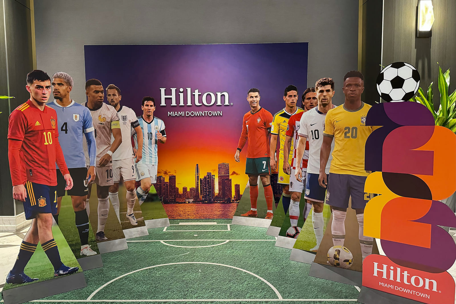 Guests enjoying the branded Hilton Miami Downtown photo opportunity created by A3 Visual for the Match Day Stay Host City Experience.