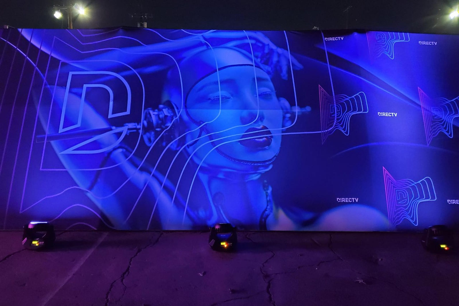 Close-up of the DIRECTV tunnel exterior featuring custom environmental graphics produced by A3 Visual.