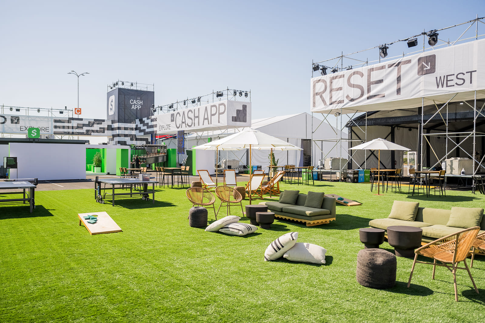 Branded lounge area featuring custom environmental graphics and large-format signage produced by A3 Visual for Block By Block 2025.
