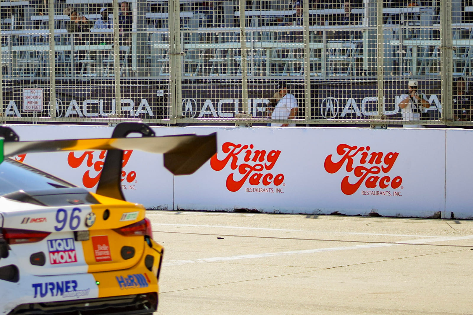 Custom sponsor wall graphics installed along the Acura Grand Prix of Long Beach racecourse.