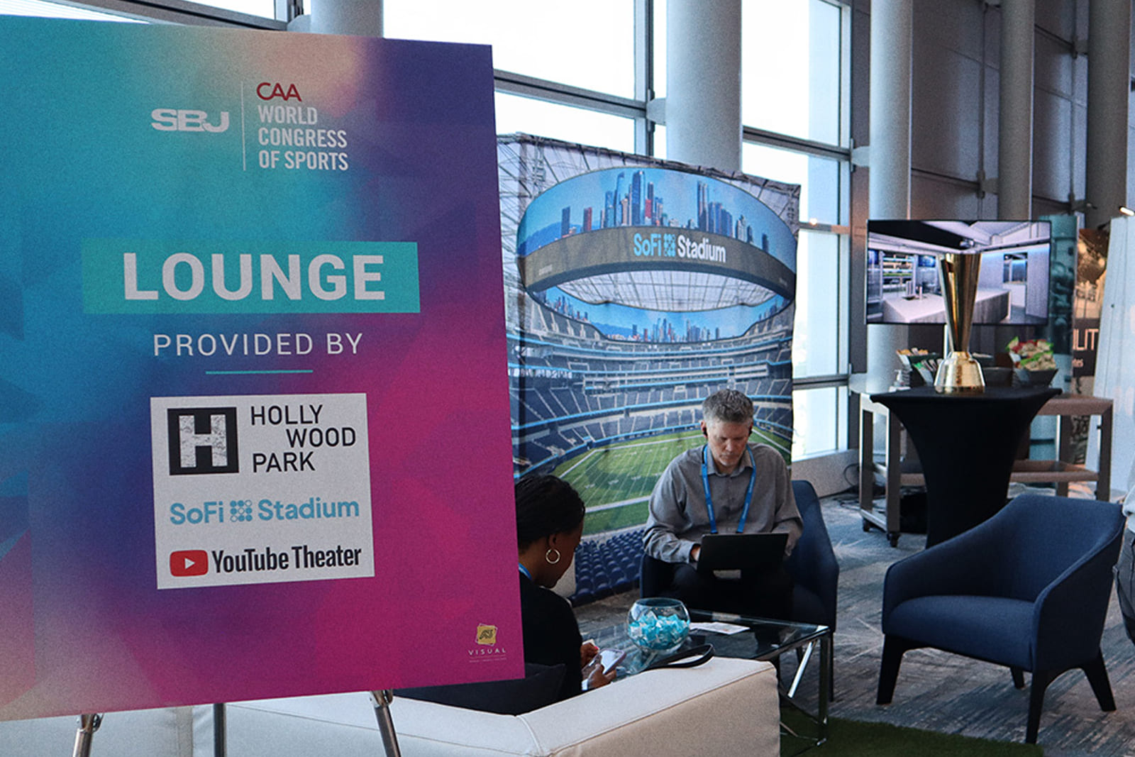 Custom lounge signage and sponsor branding created by A3 Visual for the Sports Business Journal World Congress of Sports.