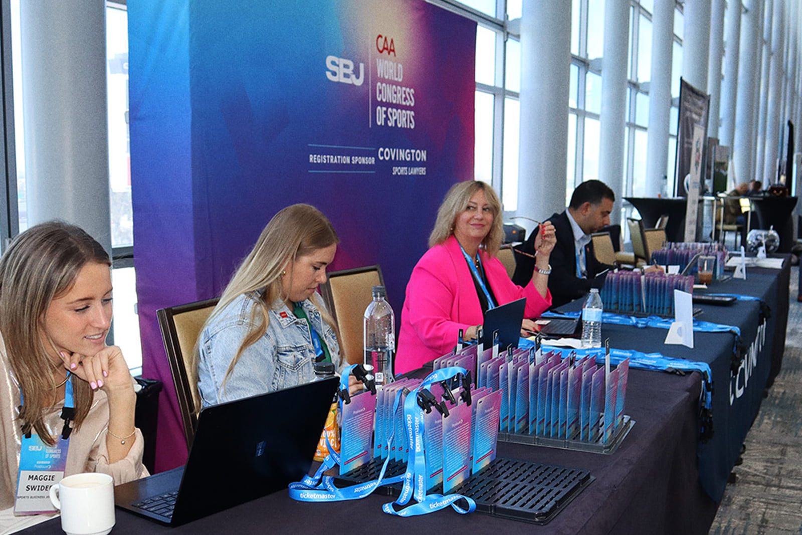 Registration area featuring custom welcome signage and event branding produced by A3 Visual for the Sports Business Journal World Congress of Sports.